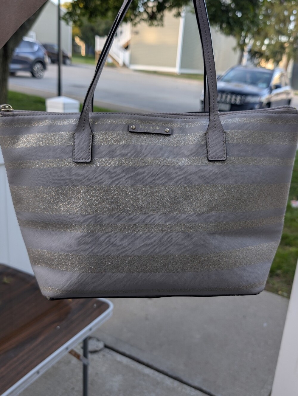 kate spade gray tote with gold glitter stripes